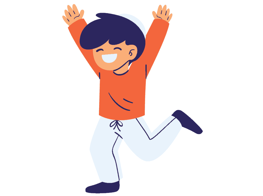 young boy orange shirt blue pants smiling with hands in the air because he is happy.