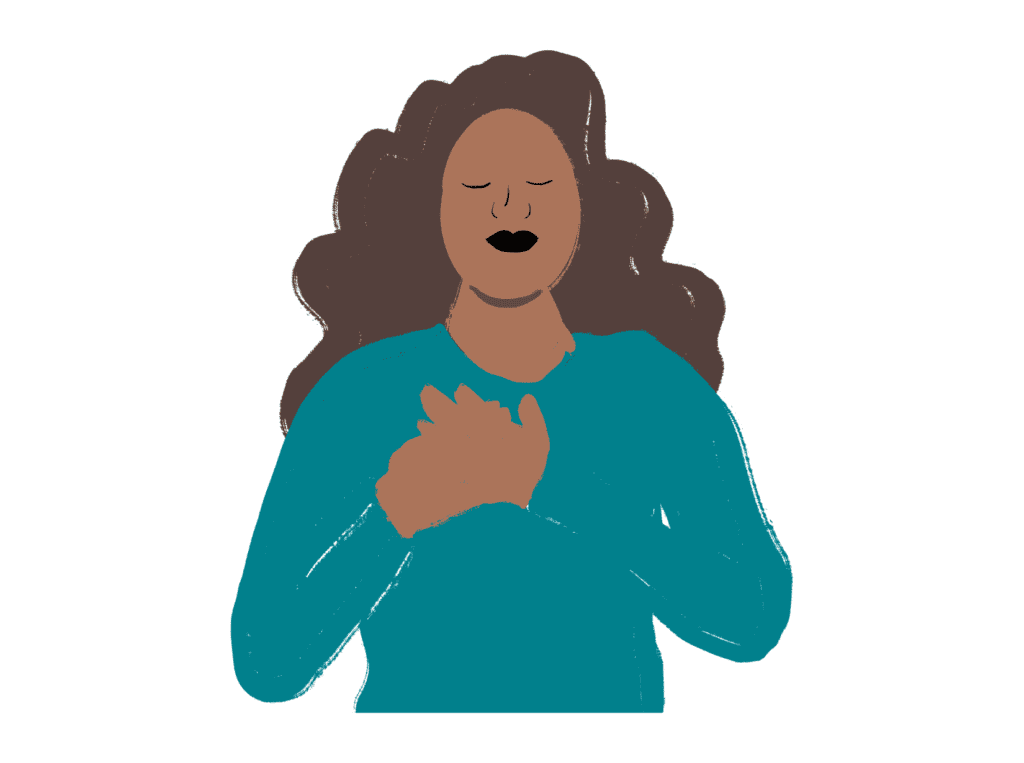 woman eyes closed holding her heart