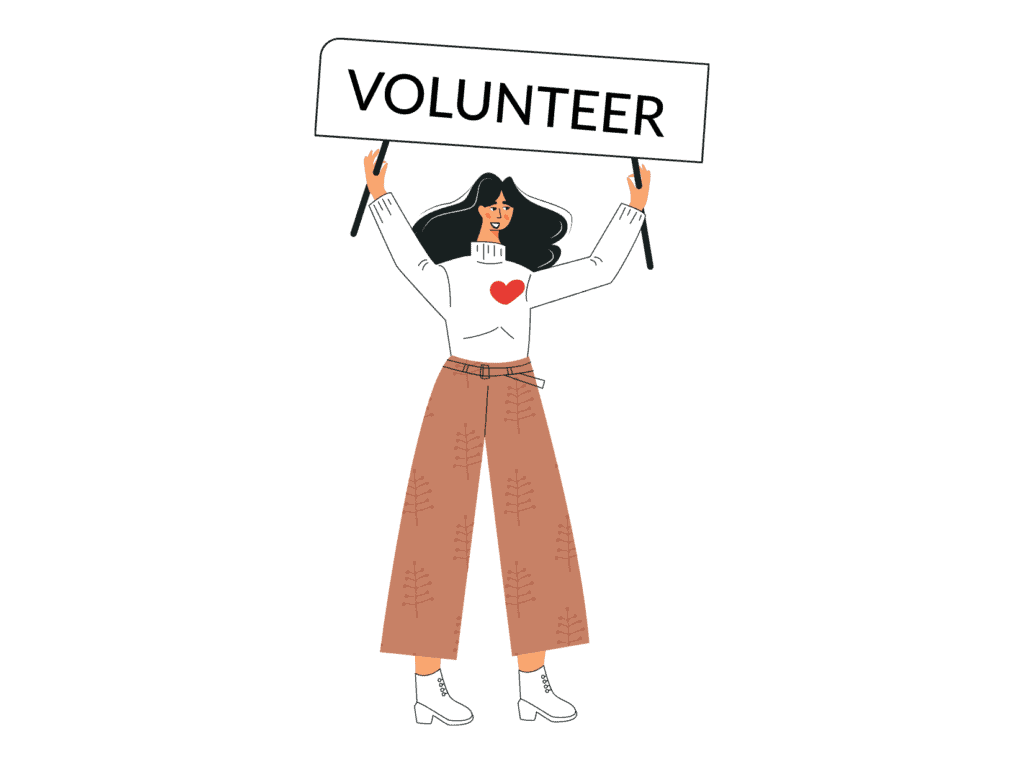 woman holding a volunteer sign representing things to do that don't cost money