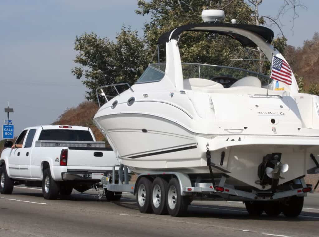 how-to-start-a-boat-transport-business truck hauling boat